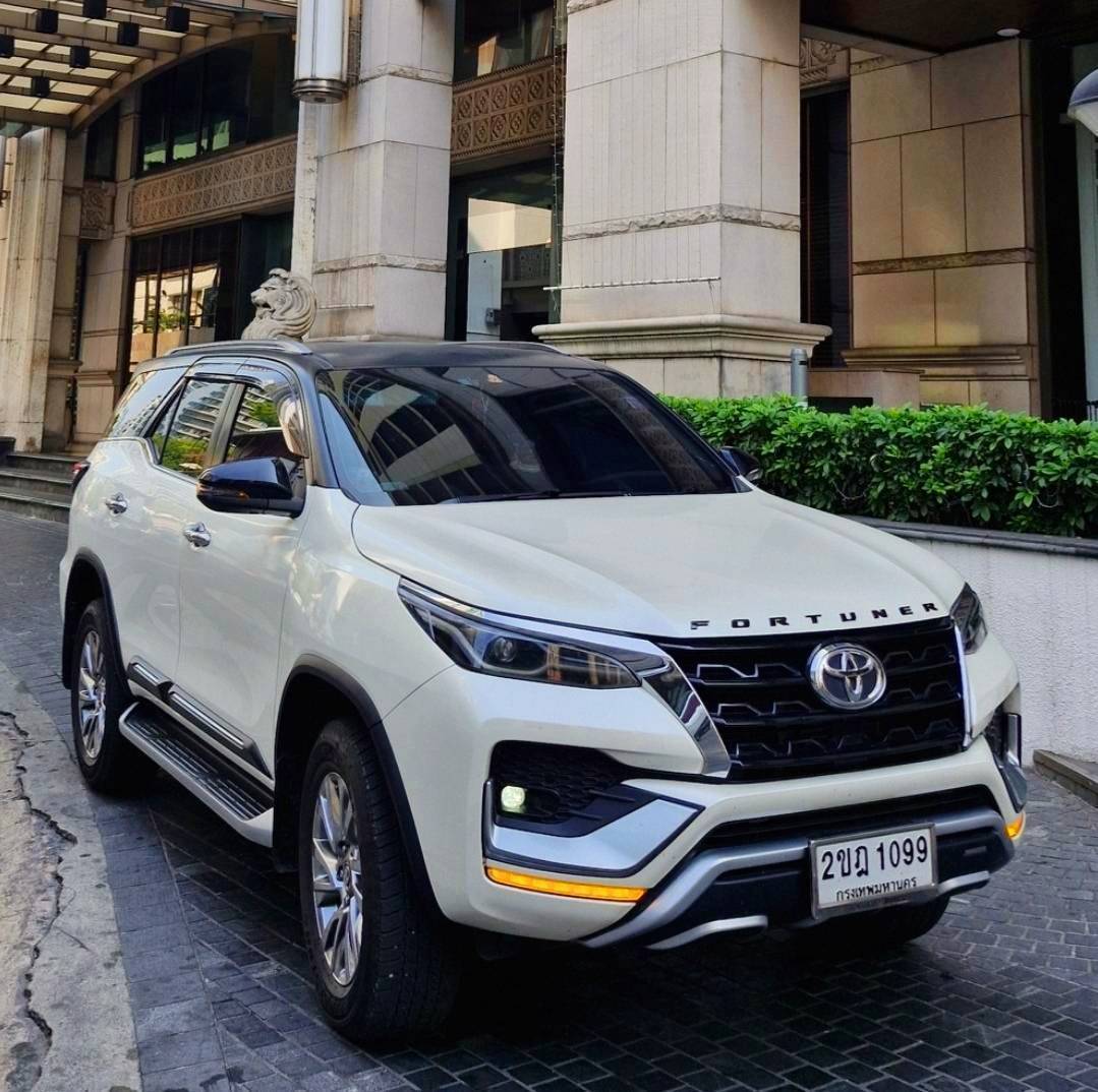 Toyota Fortuner white at luxury hotel